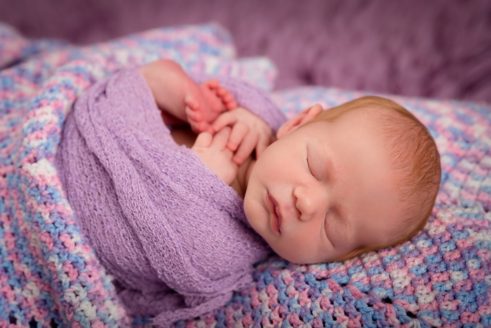 Baby wrapped in blanket
